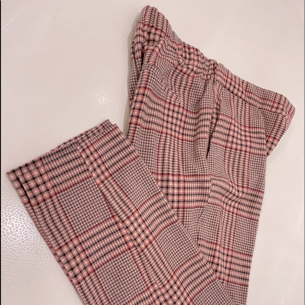 Pink and black plaid pants.